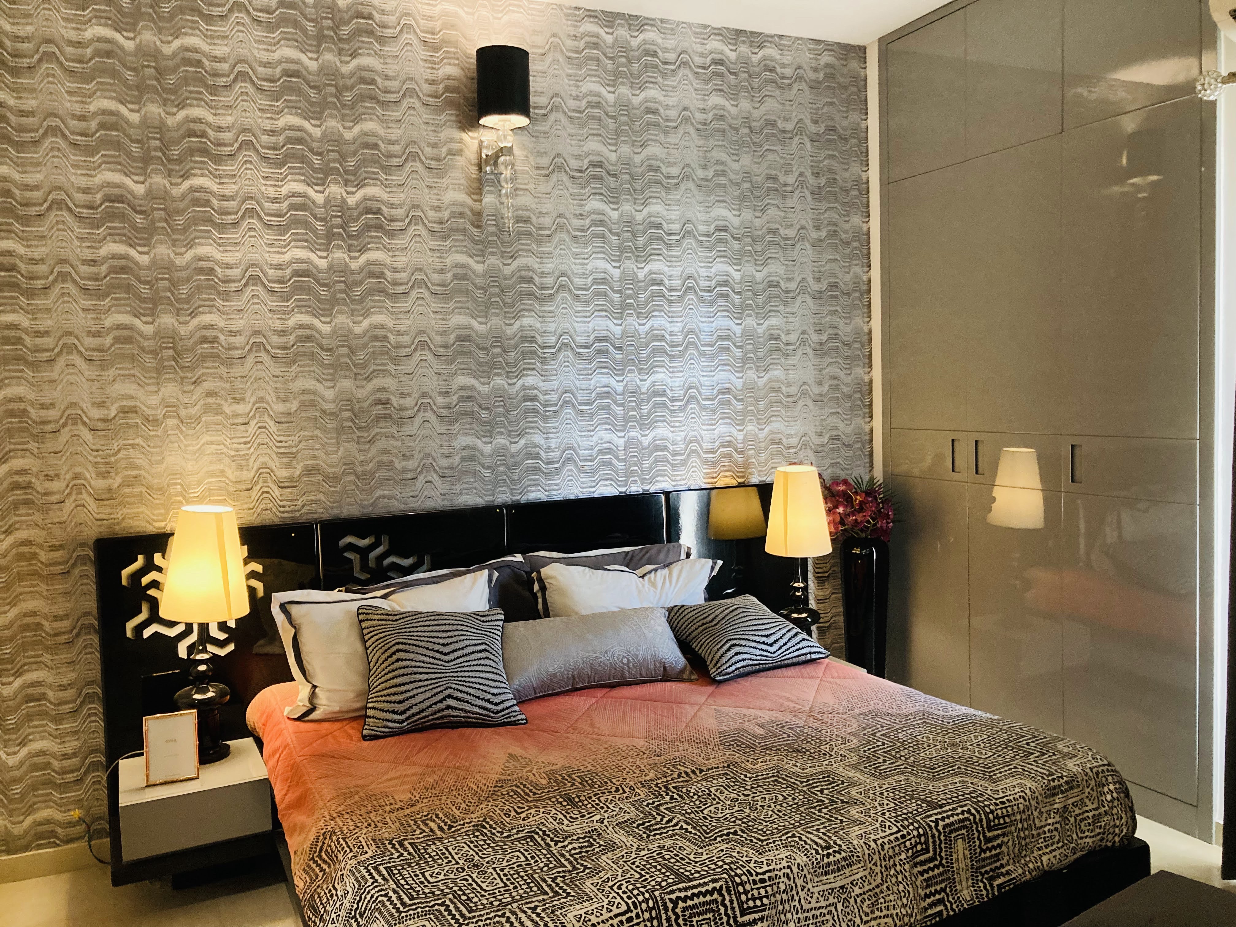 Elite Golf Green — Modern bedroom with intricate headboard design